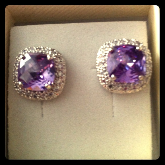 Never been worn, amethyst jeweled silver studs
