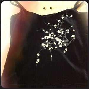 Summer top with handmade earrings.