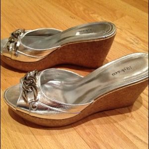 Metallic silver with chain cork wedge heels. 7.5