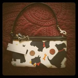 Large Dooney & Bourke doggie print slim wristlet