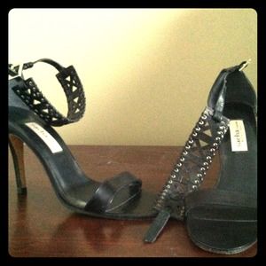 Black leather ankle strap heel by Sacha