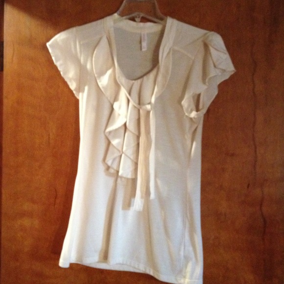 Cream shirt with neck tie and front ruffle