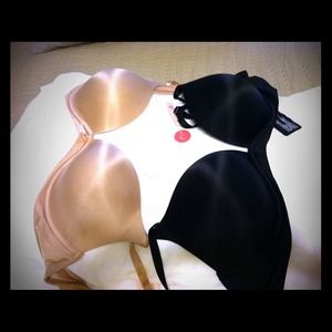 Brand new bras tags intact $70for both!