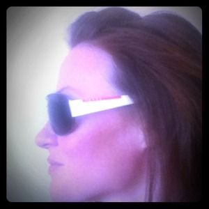 Prada sunglasses. Awesome! Case n cleaner cloth.