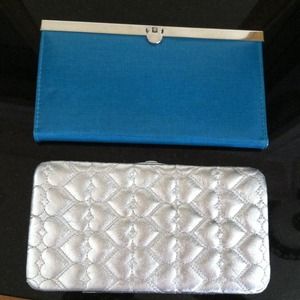 Teal clutch and silver hearts clutch