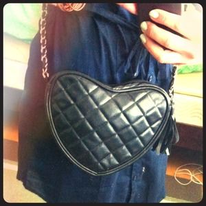 Quilted heart shaped cross body bag