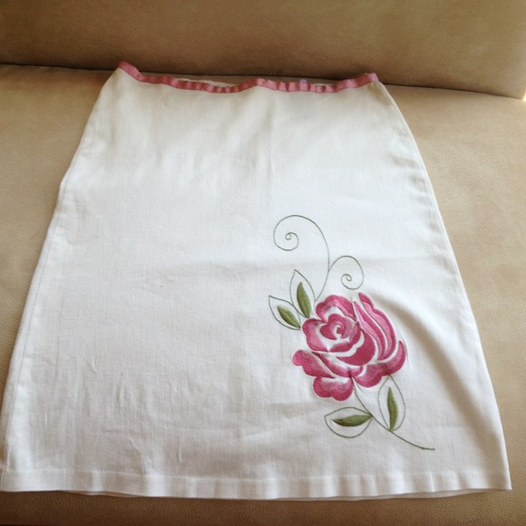 White A line skirt with embroidered pink flower. 5