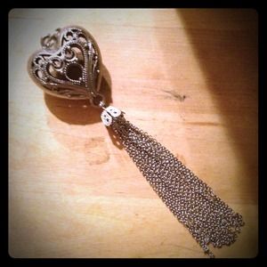 Silver cage heart pendant