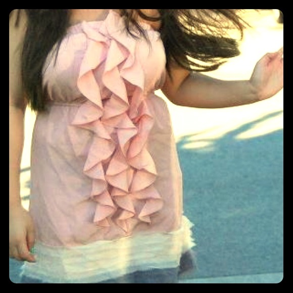 Pink ruffle dress.