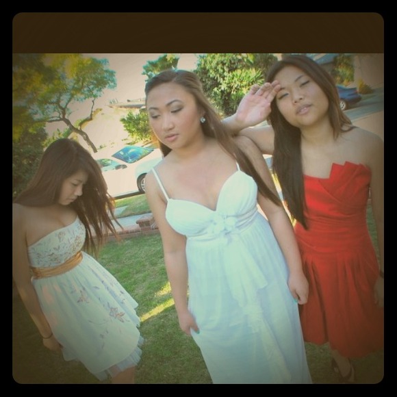 Middle: white dress w/ flower detail.