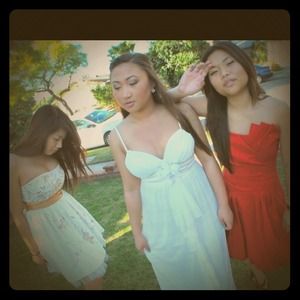 Middle: white dress w/ flower detail.