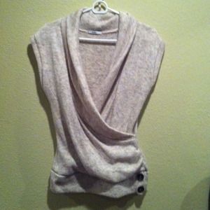 Cowl neck sleeveless sweater.