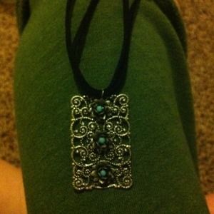 Steel finish rose talisman necklace