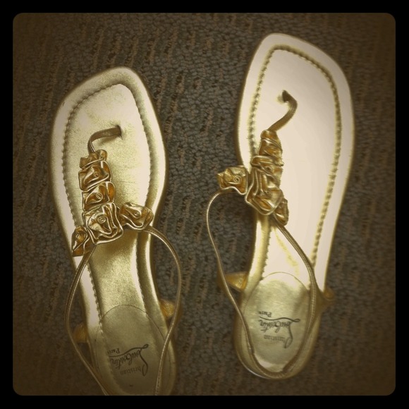 Christian louboutin gold flats