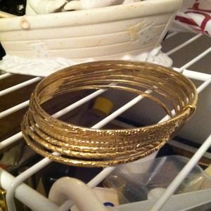 Set of seven attached bangles, goldtone