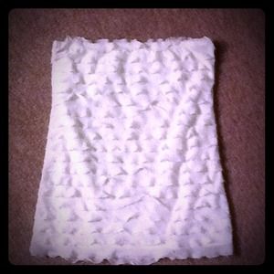 White ruffled tube top.