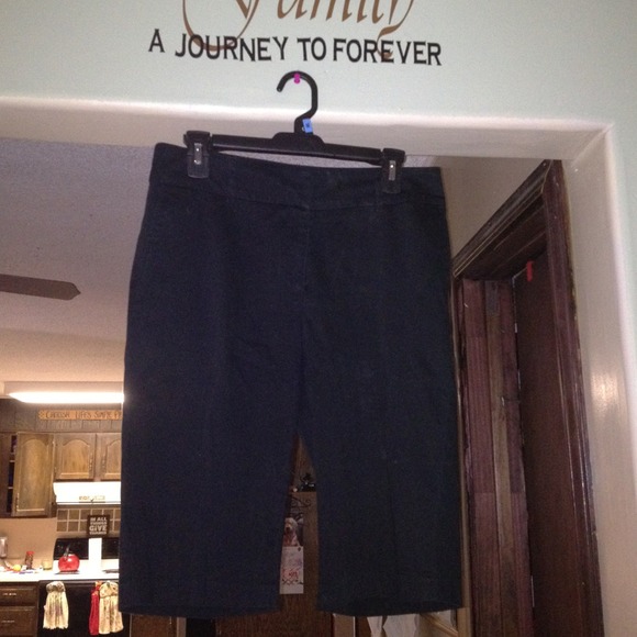 A pair of will smith long shorts