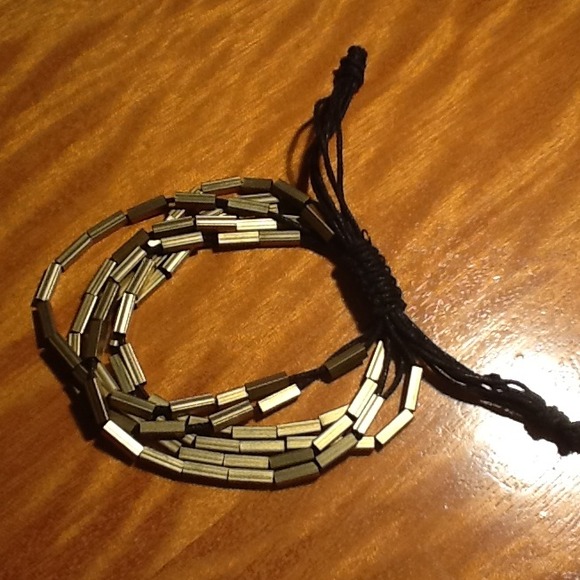 Gold toned multi-strand bead bracelet