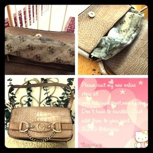SOLD...Animal print Guess handbag!!!$9