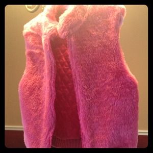Children's hot pink fuzzy vest.