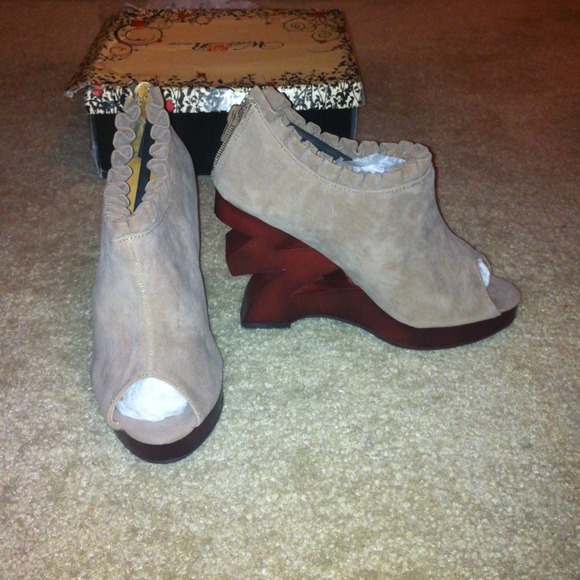 REDUCED! Never been worn sand colored suede wedges