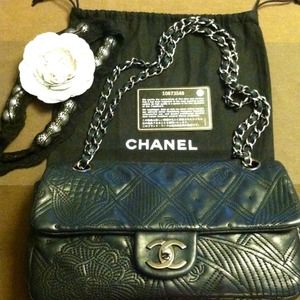 CHANEL Handbags - CHANEL leather embossed small flap bag CHANEL Handbags - CHANEL leather embossed small flap bag
