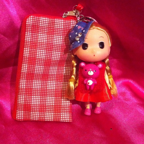 wrist strap with iPhone pouch & a cute doll