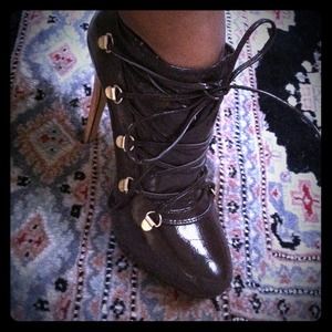 Dark brown patent shoes.