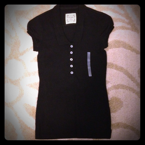 Short Sleeved Collard Shirt.