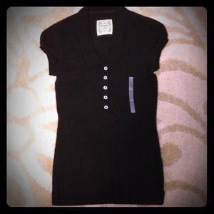 Short Sleeved Collard Shirt.