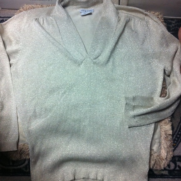Glistening with gold cream sweater
