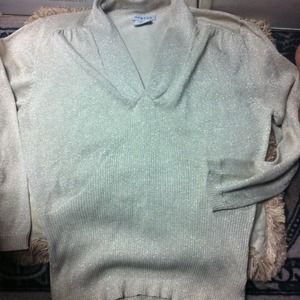Glistening with gold cream sweater