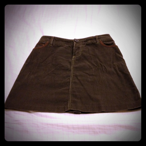Just above the knee corduroy brown skirt.