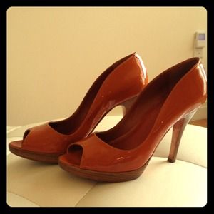 Orange patent leather peep toe pump