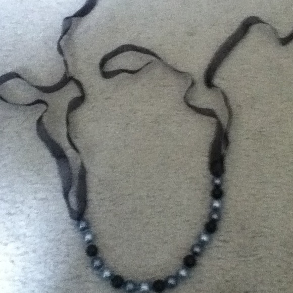 Black pearl necklace. New