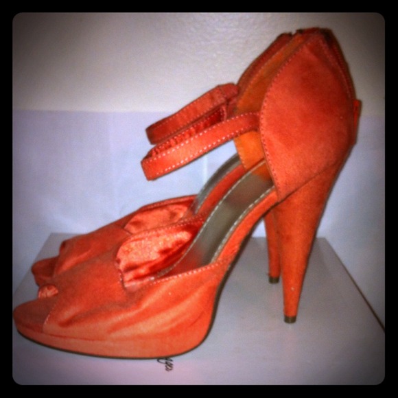 Beautiful Tangerine peep toe, ankle strap heels.