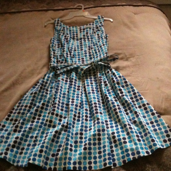 Blue and white polka dot dress with pleated bodice