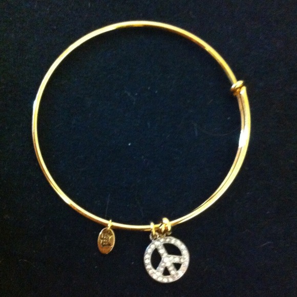 Juicy Couture Gold Bangle Bracelet w/ Peace Charm - Picture 1 of 3