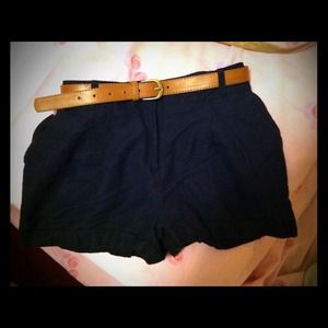 High waisted shorts with skinny belt.