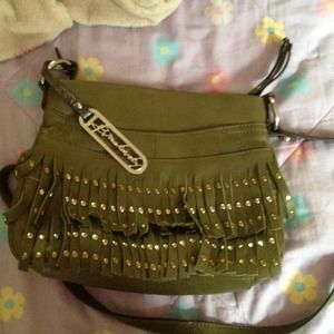 B. Makowsky green fringe satchel