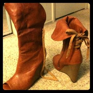 Open toed camel colored boots.