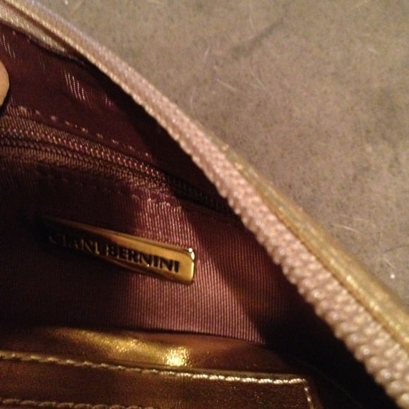 Cute little gold clutch. - Picture 3 of 3