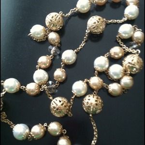 Long gold and pearl necklace