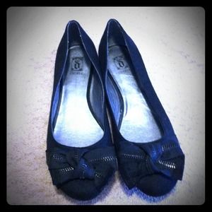 Black flats with zipper bow