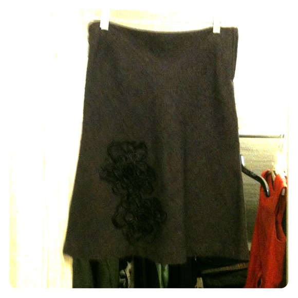 Vintage purple wool skirt with floral embroidery.