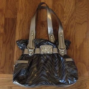 Zebra print Kathy purse and 7 jeans