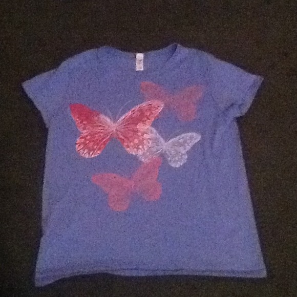 Blue tee with salmon-colored butterflies