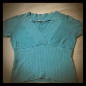 Teal form fitting v-neck