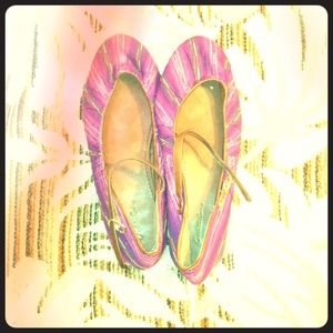 Purple flats with a little colorful stitching