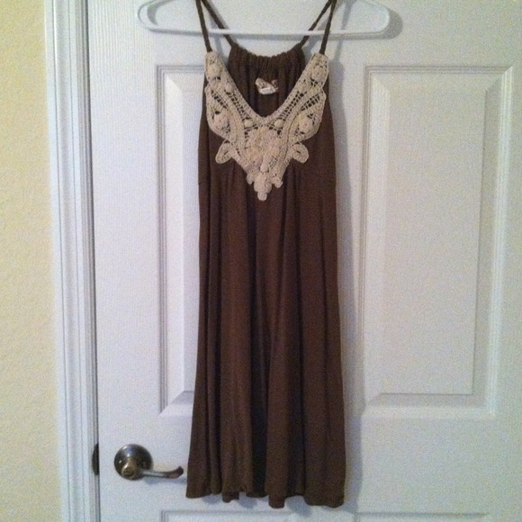 Brown dress with cream crocheting.